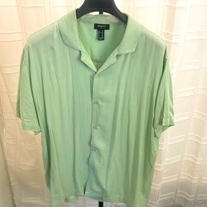 Mint green short sleeve button down shirt for vacation and spring / summer